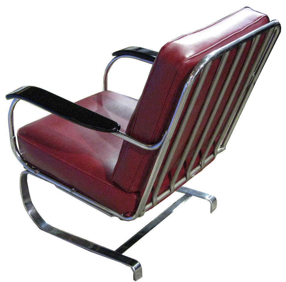 This pair of supremely comfortable American art deco arm chairs was designed ca. 1935 for Lloyd Manufacturing by Karl Emmanuel Martin (KEM) Weber (1889 -1963).  Known as the “Springer” chair, the chairs sit on flat band chrome steel springs and