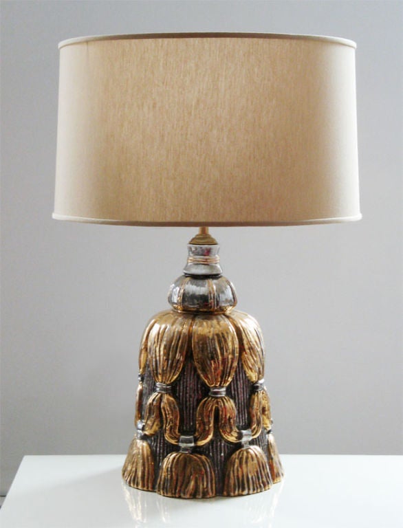 20th Century Ceramic Italian tassel table lamp with gold and silver glazes.