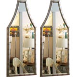 Chic pair of silver leafed mid-century mirrors James Mont style. Chic pair of silver leafed mid-century mirrors James Mont style.