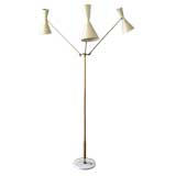 Italian Stilnovo attributed adjustable three arm floor lamp.