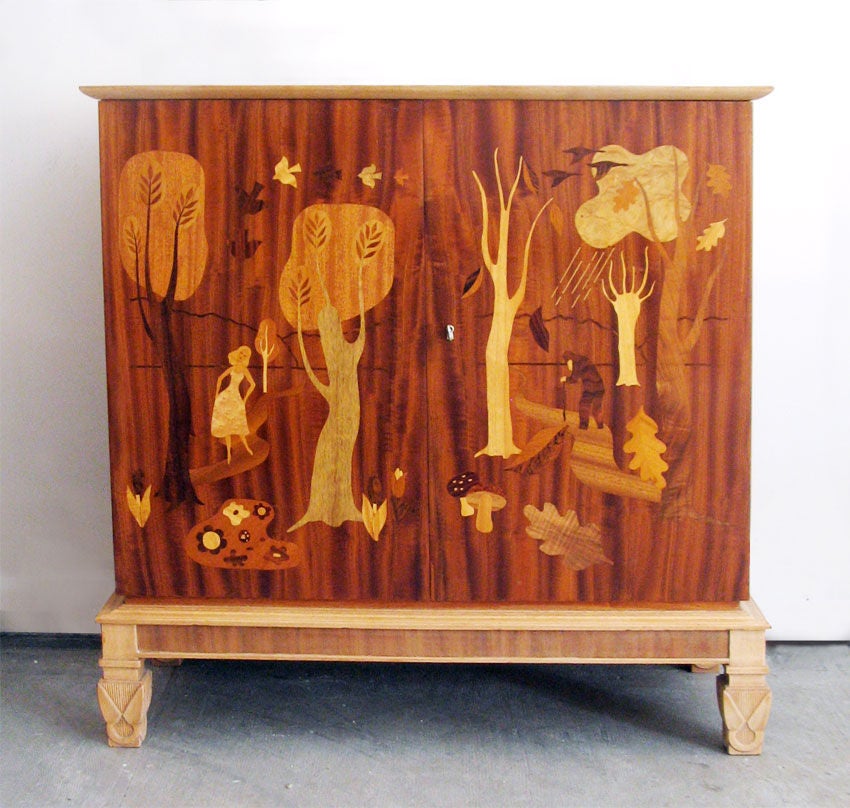 Swedish 1940's cabinet with exquistiely detailed marquetry of various exotic woods. Signed 
