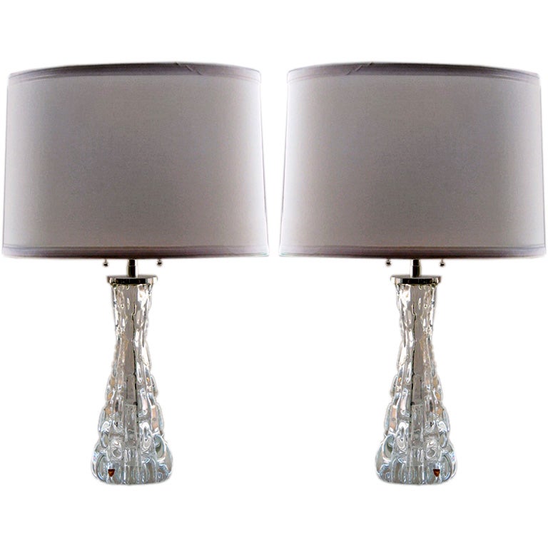 Pair, Swedish Orrefors clear crystal lamps with nickel hardware.