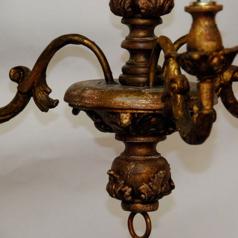 Gilded three arm chandelier