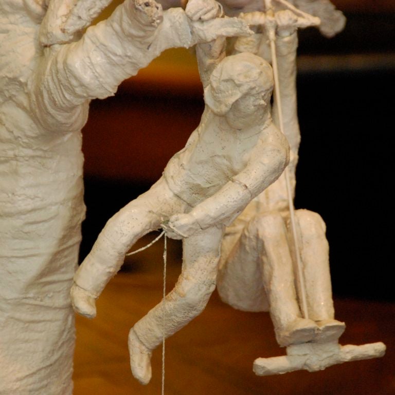 Paper mache sculpture on lucite base