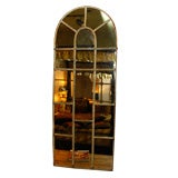 Arched iron window frame mirror