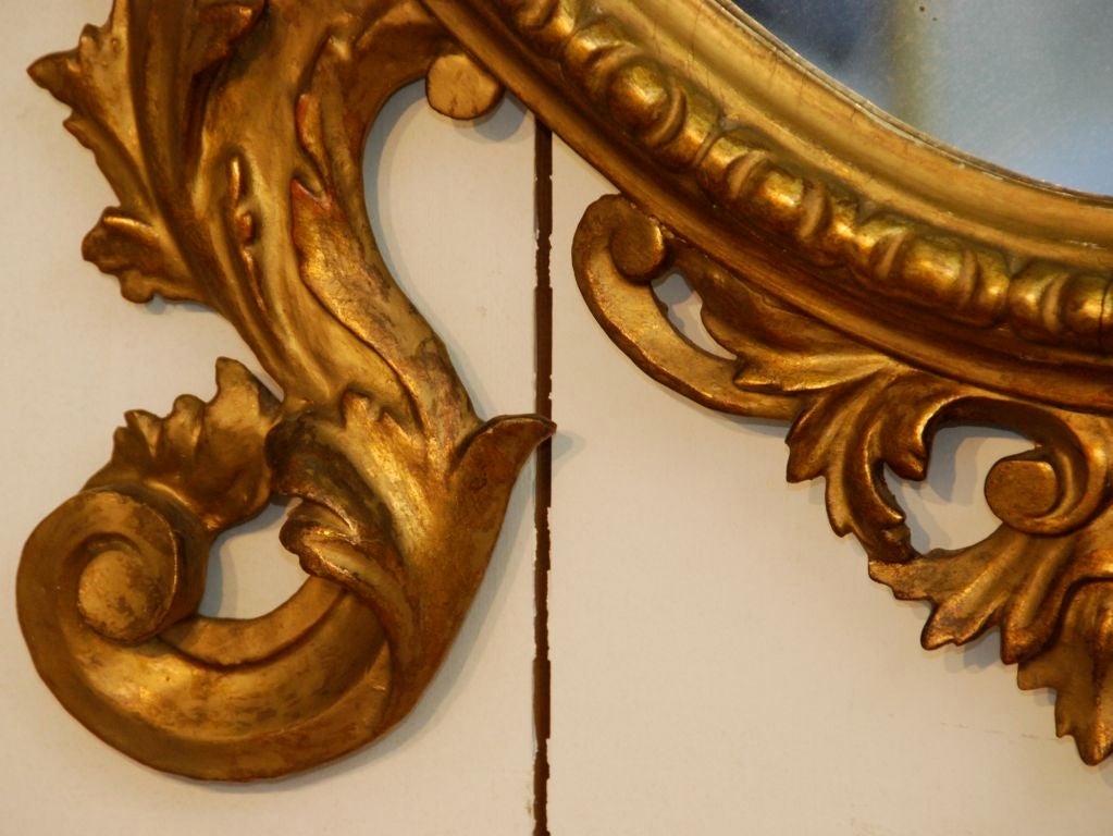 French oval gilded mirror