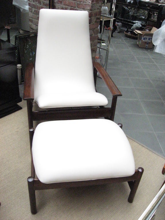 Newly reupholstered lounge chair with solid bentwood back and ottoman. Adjustable tilt features on both ottoman and chair.