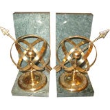 Pair of Brass Globe Arrow Bookends on Marble Slabs