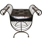 Iron bench with leather cushion in style of René Prou