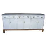 A Hollywood Regency White Lacquered Sideboard