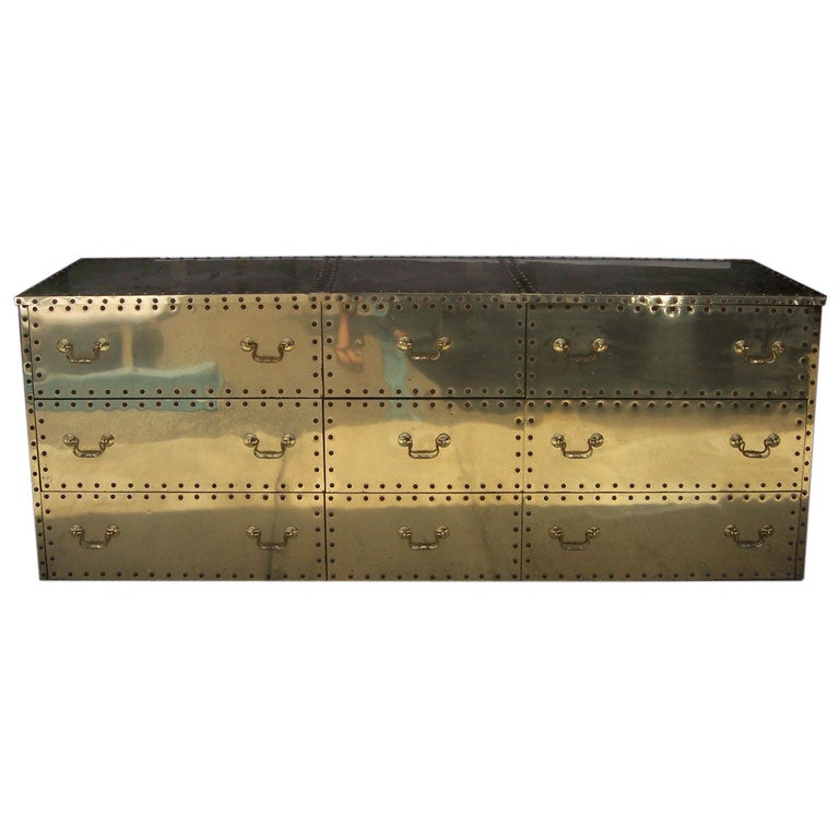 A Sarreid Long Brass Studded Dresser