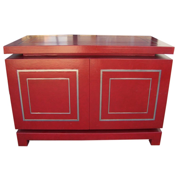 An Hermes Red Leather Wrapped Cabinet