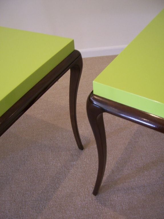 Phenomenal chartreuse top in high gloss lacquer sits atop dark mahogany lacquered wood base. Elegant tapering curved legs. Perfect to be used as game table, breakfast table or foyer.