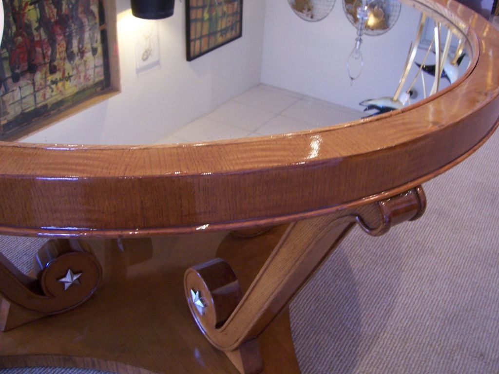 Extremely unique, mirror top with parquet wood on base and silver leaf star medallions details. 