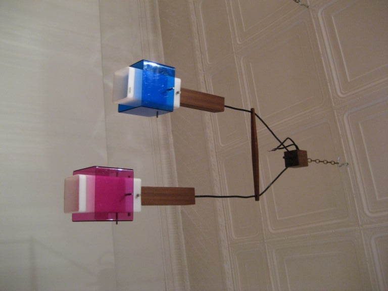 Colored Lucite and Wood Chandelier designed by Harvey - Guzzini