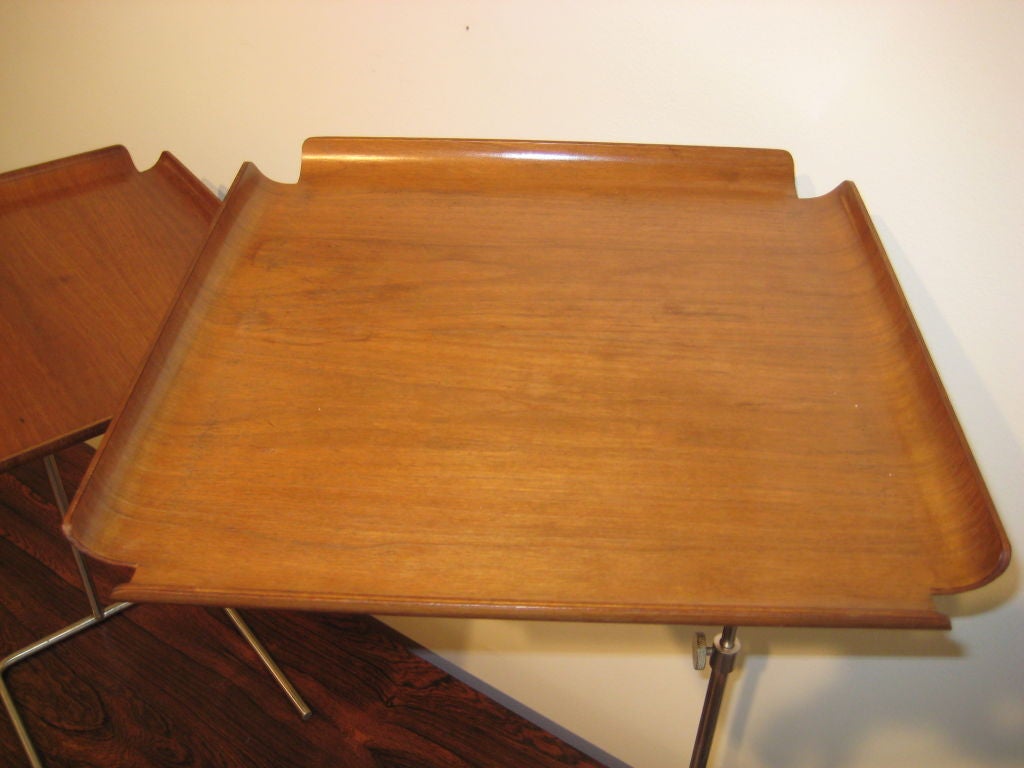 George Nelson for Herman Miller adjustable tray tables.  Great for eating in front of the TV or for extra serving surface.  Priced for one.