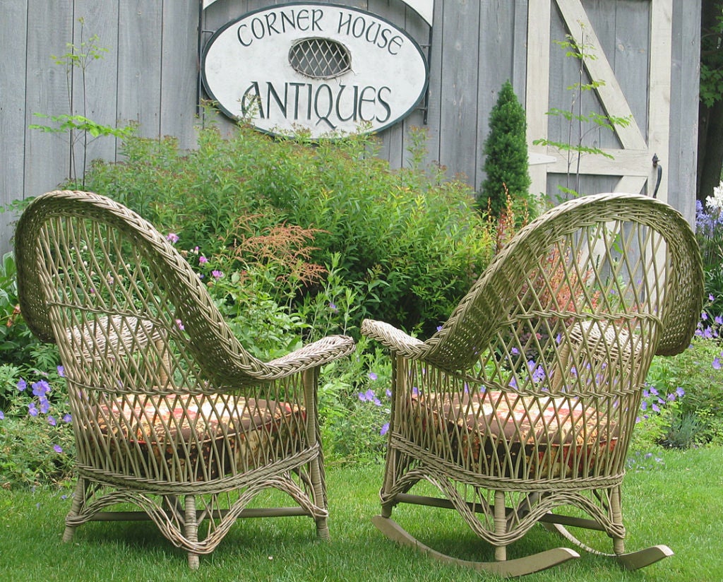 Matching pair arched-back Bar Harbor wicker armchair and rocker in in worn bone color painted finish.  Can be re-painted any color on request. Traditional diagonal criss-crossed reeds, high backrests, wide flared arms.  Original box spring seat