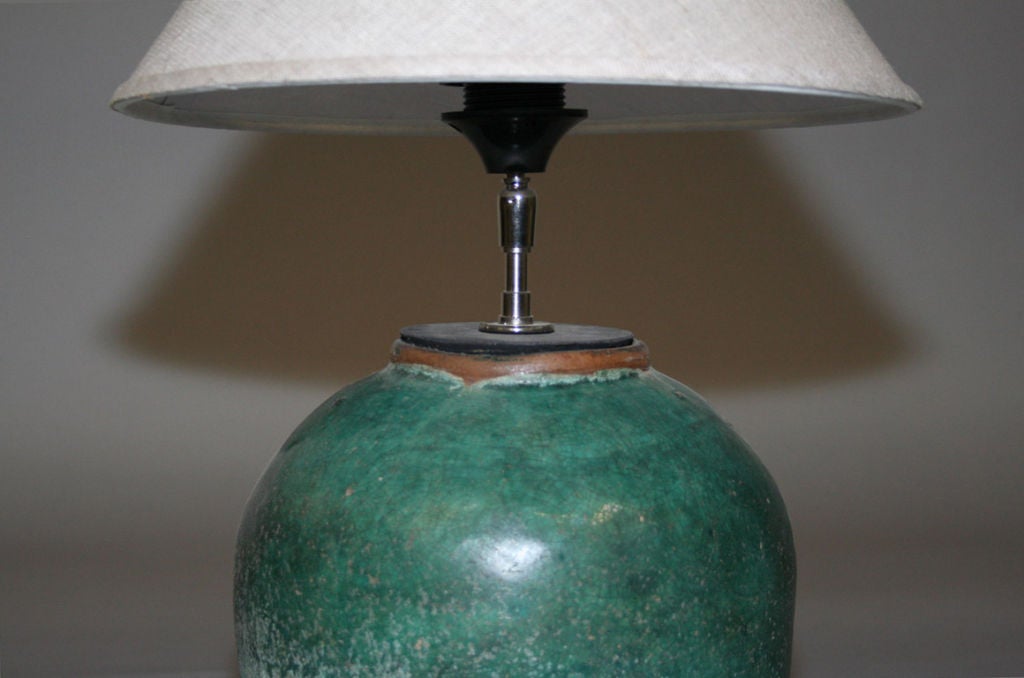 Green Glazed ceramic ginger jar lamps.<br />
<br />
Keywords:  Lighting, lamps.