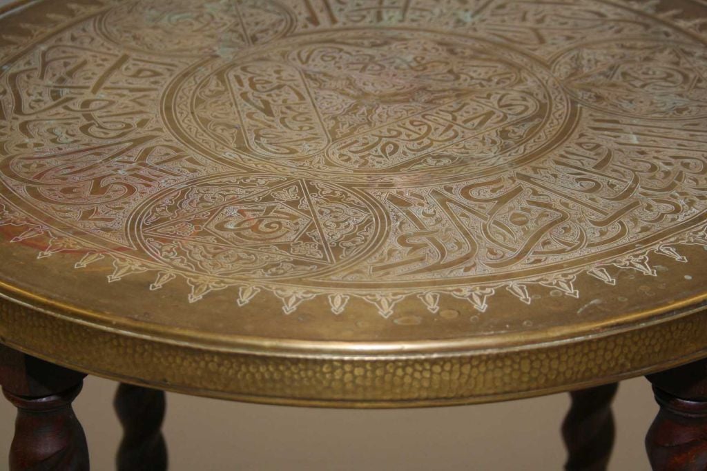 Vintage Brass Top Table with intricate carving and turned legs.  Can be used as coffee table, side or end table, or occasional table.