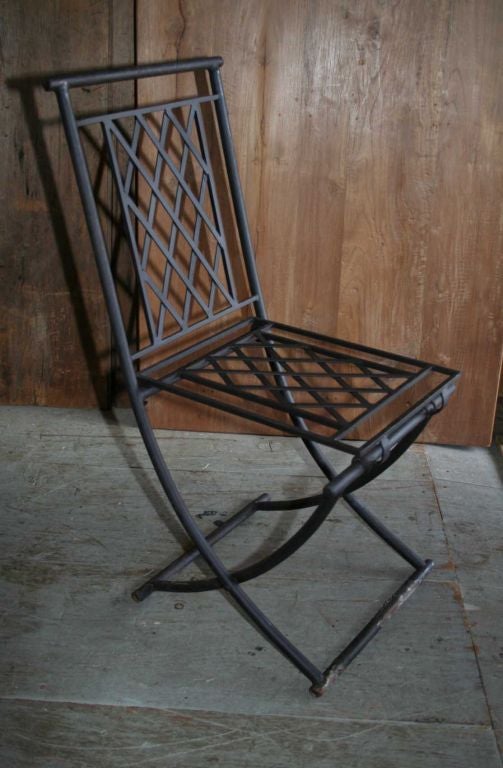 Stylish and comfortable folding metal chairs.  Perfect for indoor or outdoor use.  $400 Each.

Keywords:  Garden furniture, garden chairs, bistro chair