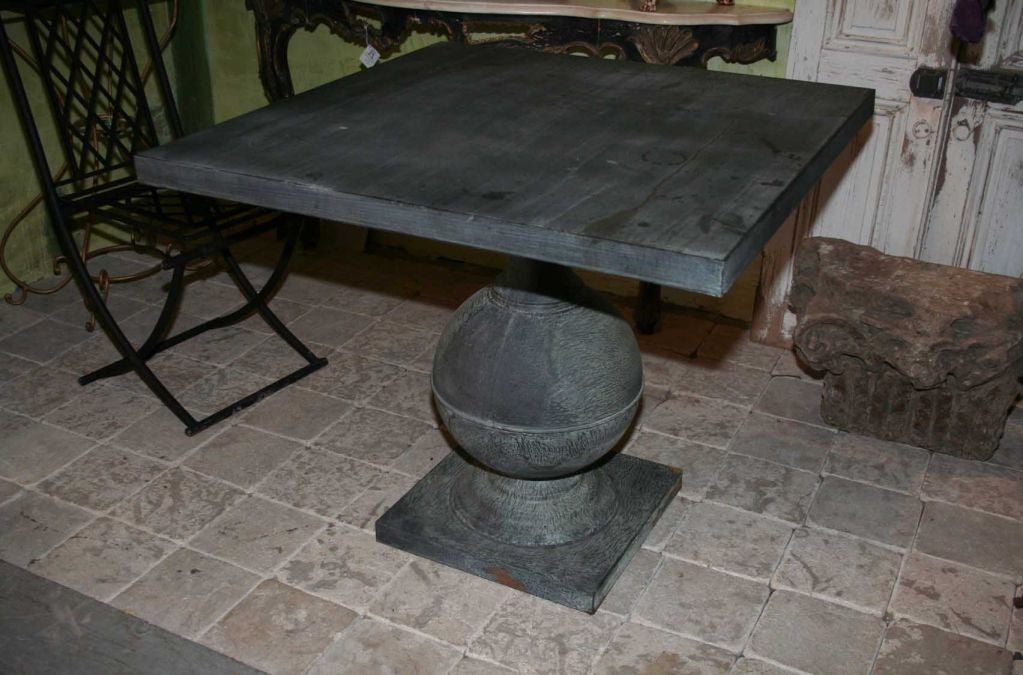 Extraordinary zinc covered square pedestal table.  Perfect for garden or center hall table.<br />
<br />
Keywords:  Game table, side table, breakfast table, night stands, end table.