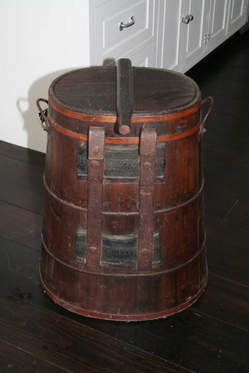 Chinese Wood Water Bucket.  Can be used as side table or simply as a sculptural piece.

Keywords:  Flower container, planter, vase, umbrella stand.