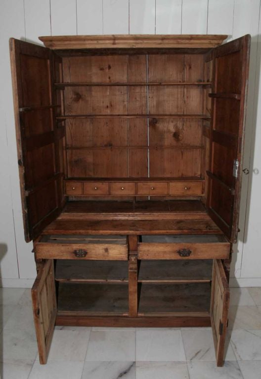 Wonderful country pine cupboard in 2 separate pieces.   Length at the top is 44