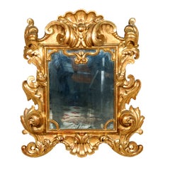 An Important Baroque Giltwood Mirror