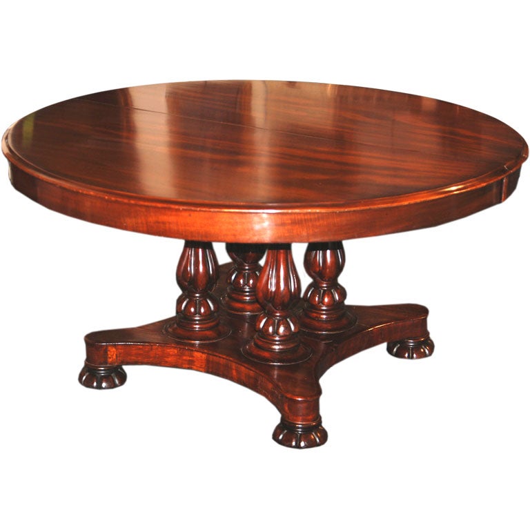 A Fine English Mahogany Extending Round Dining Table