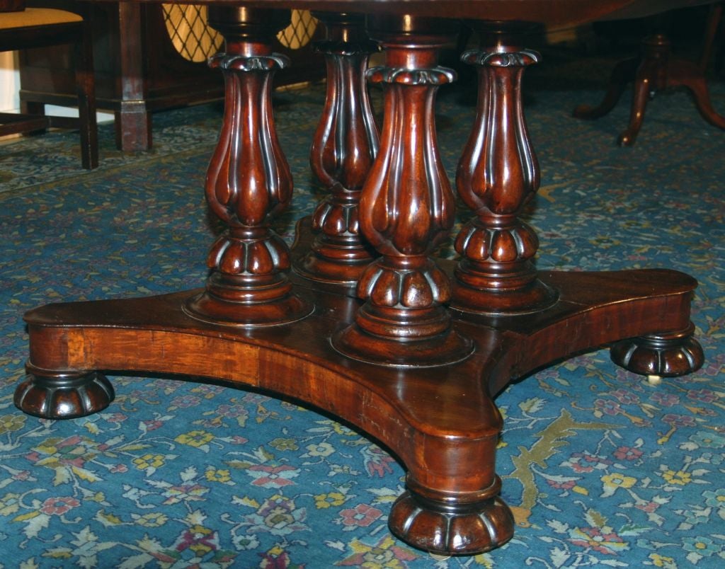 A Fine English Mahogany Extending Round Dining Table 2