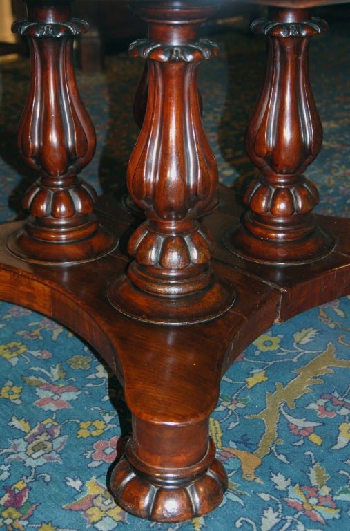A Fine English Mahogany Extending Round Dining Table 3