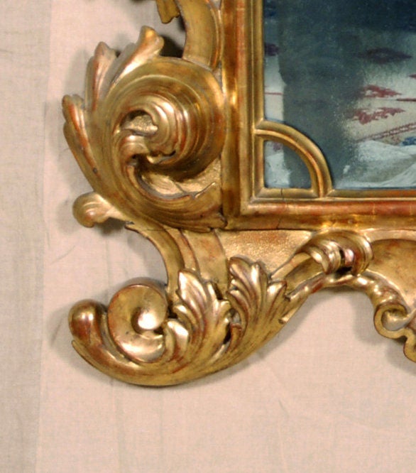 An Important Italian Baroque Giltwood Mirror 2
