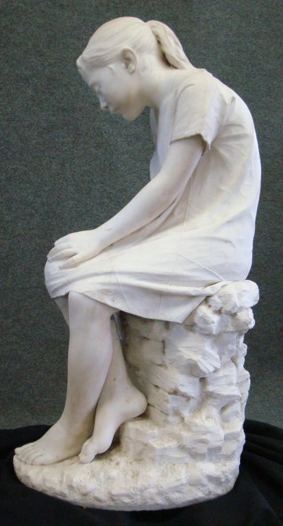 Life size marble of a Girl Sewing. By Salvatore Albano.  dated 1880.  Salvatore studied under Sorbille in 1860.  after studied at the academy under sculpture Tito Angelini.  he gained great fame with the master piece "Conte Ugolini" in