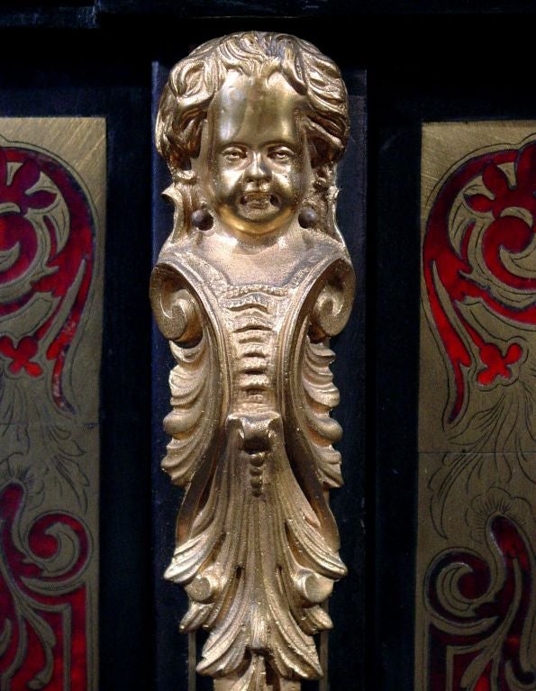 An Ormolu Mounted Ebonized Red Tortoiseshell & Brass Cabinet