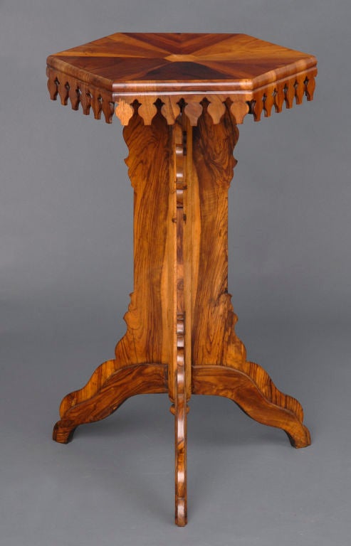 Most unusual exotic specimen wood hexagonal-top table with carved 