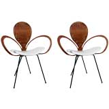 Pair of Wrought Iron and Wicker "Fleur de Lyse" chairs