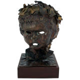 Haunting Hammered Bronze Bust of a Child on  a Wood Pedestal
