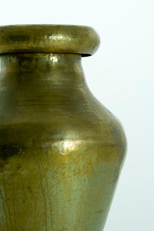 This classically shaped water vessel, known in India as a kalsi, is common to many Indian households, and is made of hammered brass.