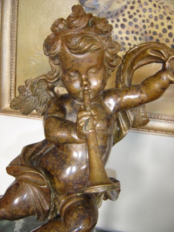 Pair of Patinated Bronze Putti with Musical Instruments