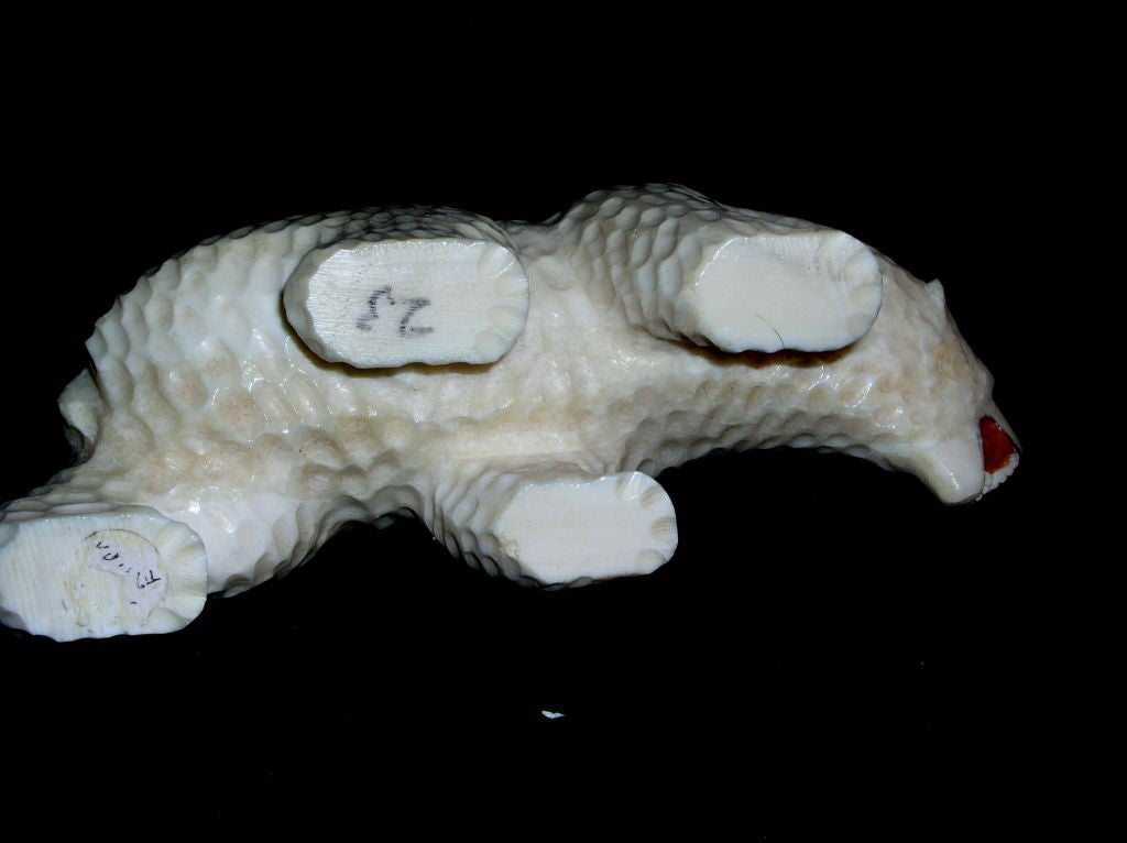 American Inuit or Eskimo carved ivory figurine of a polar bear.