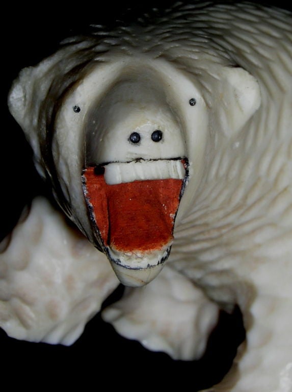 20th Century Inuit or Eskimo carved ivory figurine of a polar bear.