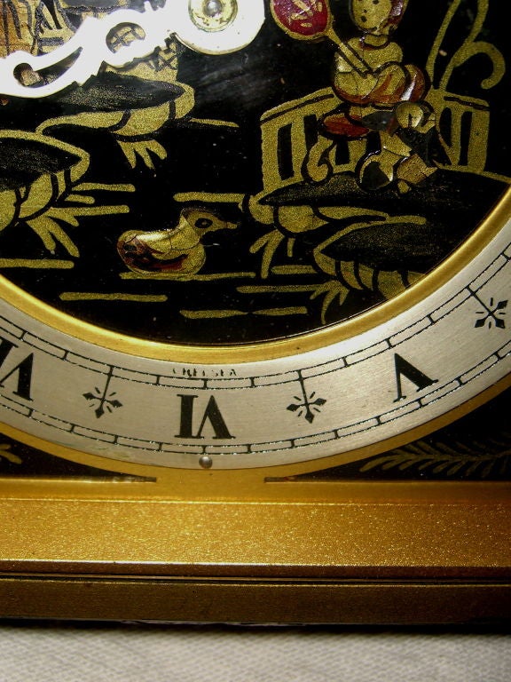 A beautiful chinoiserie themed enameled clock by the prestigious American Clock manufacturer the Chelsea Clock company. It is in running condition.