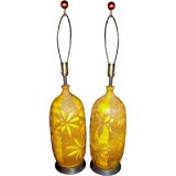 Nice pair of 1966 california ceramic lamps with palm leaf motif