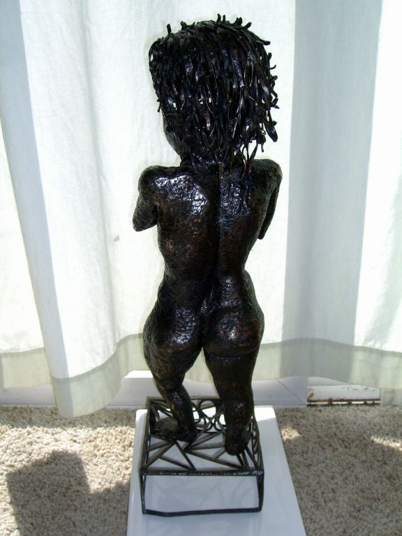 Wonderful Iron sculpture of Saxophone player chubby nude
