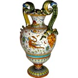 Vintage Cantagalli Italian Majolica snake handled urn with cherubs