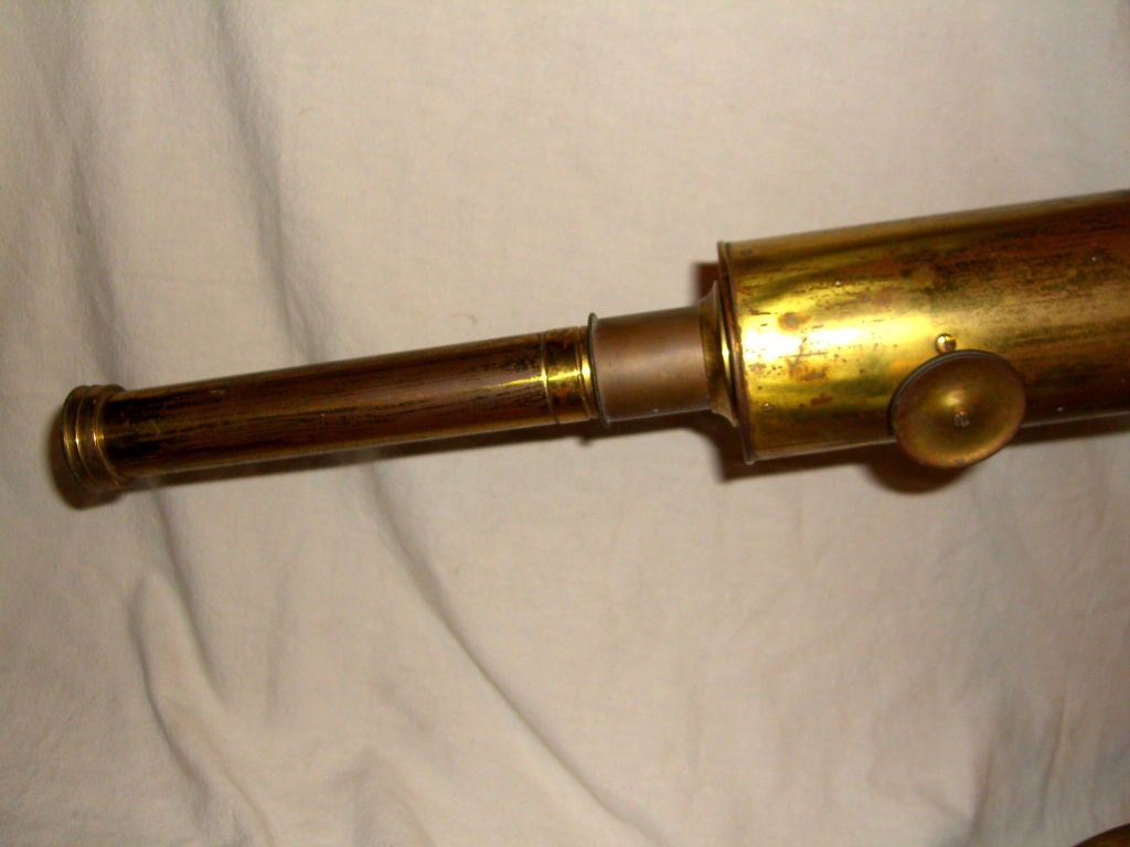 A late 19th or early 20th century telescope by the prestigious English maker C. Baker of 244 High Holborn, London. It shows alot of wear and use and the glass is dusty but it really does work well, and focuses smoothly. Mostly known as a microscope