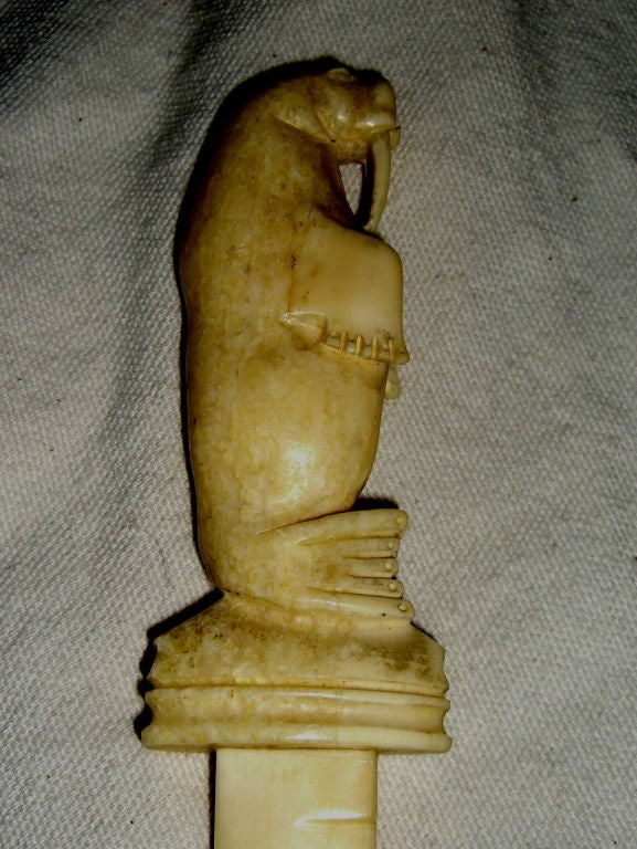 Mid-20th Century Inuit or Eskimo carved bone letter opener with a Walrus on top