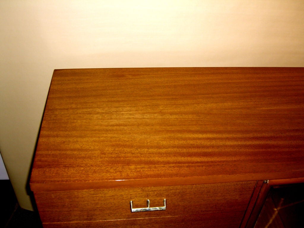 Beautiful bleached mahogany & hand beveled glass door case piece