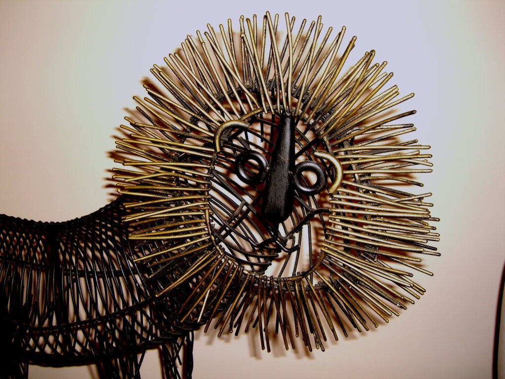 Whimsical 1970's hand welded sculpture of a lion w/gold mane