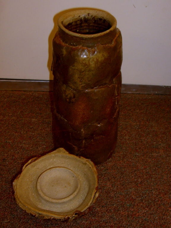 3 beautiful pieces of stoneware that are all signed Fred Moore. I don't know anything about the artist, we just loved the look and feel of the pieces. One looks likes it's stretched like a classic George Ohr piece. The first and tallest is a lidded